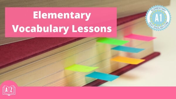 Close-up of a book with colorful tabs, featuring the text 'Elementary Vocabulary Lessons' and an A1 Elementary badge.
